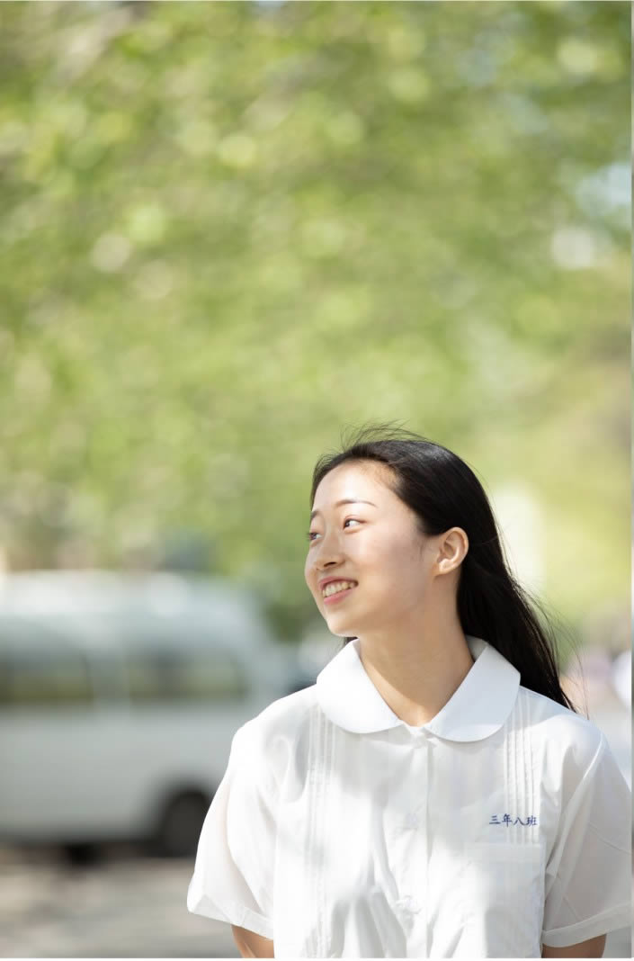 PS调出虚化校园背景小清新女生照片