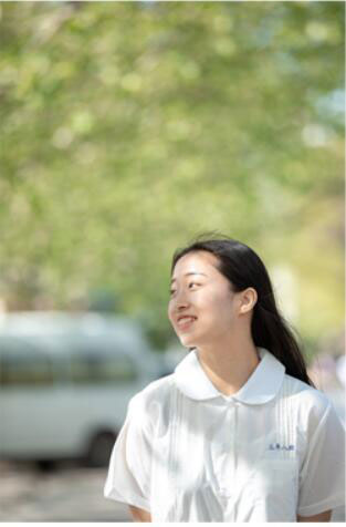 PS调出虚化校园背景小清新女生照片